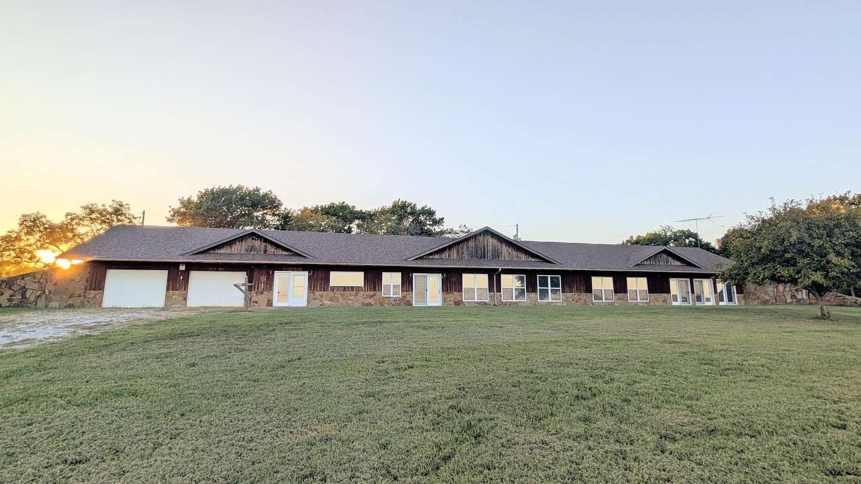 80 Acres of Agricultural Land with Home for Sale in El Dorado Springs, Missouri