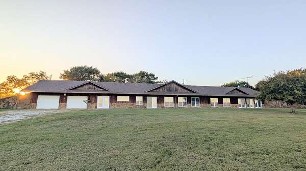 80 Acres of Agricultural Land with Home for Sale in El Dorado Springs, Missouri