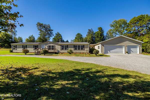 2.6 Acres of Residential Land with Home for Sale in Greenback, Tennessee