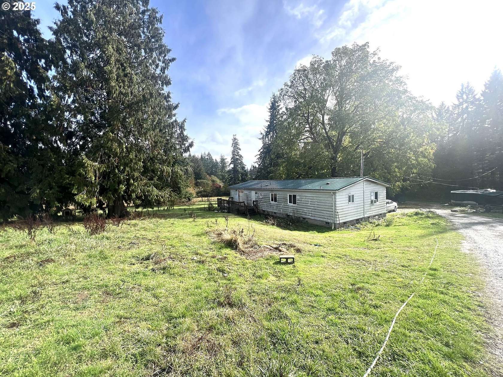 6.1 Acres of Land with Home for Sale in Rainier, Oregon