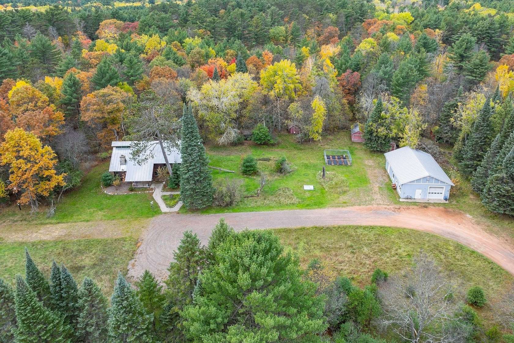 3 Acres of Residential Land with Home for Sale in Minocqua, Wisconsin