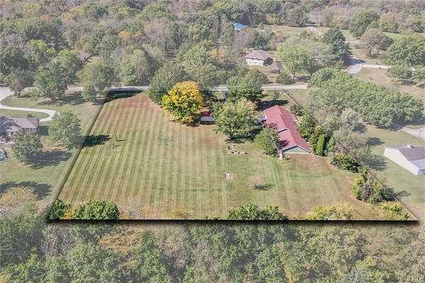 2.57 Acres of Residential Land with Home for Sale in Peculiar, Missouri