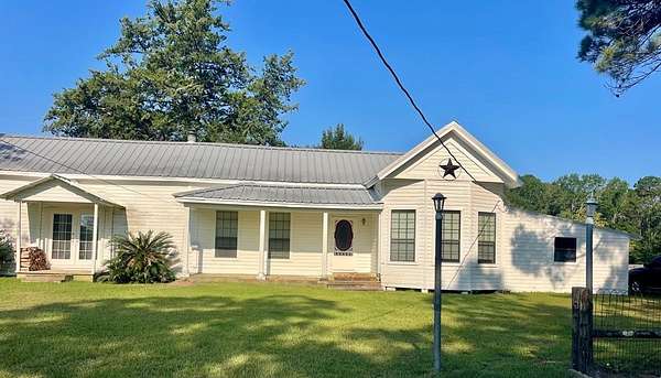 3.67 Acres of Land with Home for Sale in Brookeland, Texas