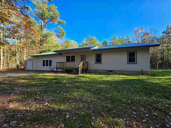 4.76 Acres of Residential Land with Home for Sale in Pellston, Michigan