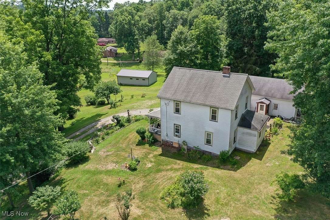 105 Acres of Recreational Land with Home for Auction in New Philadelphia, Ohio