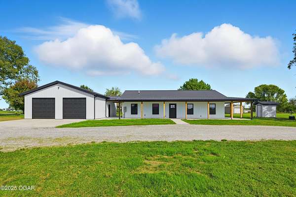 10 Acres of Residential Land with Home for Sale in Carthage, Missouri