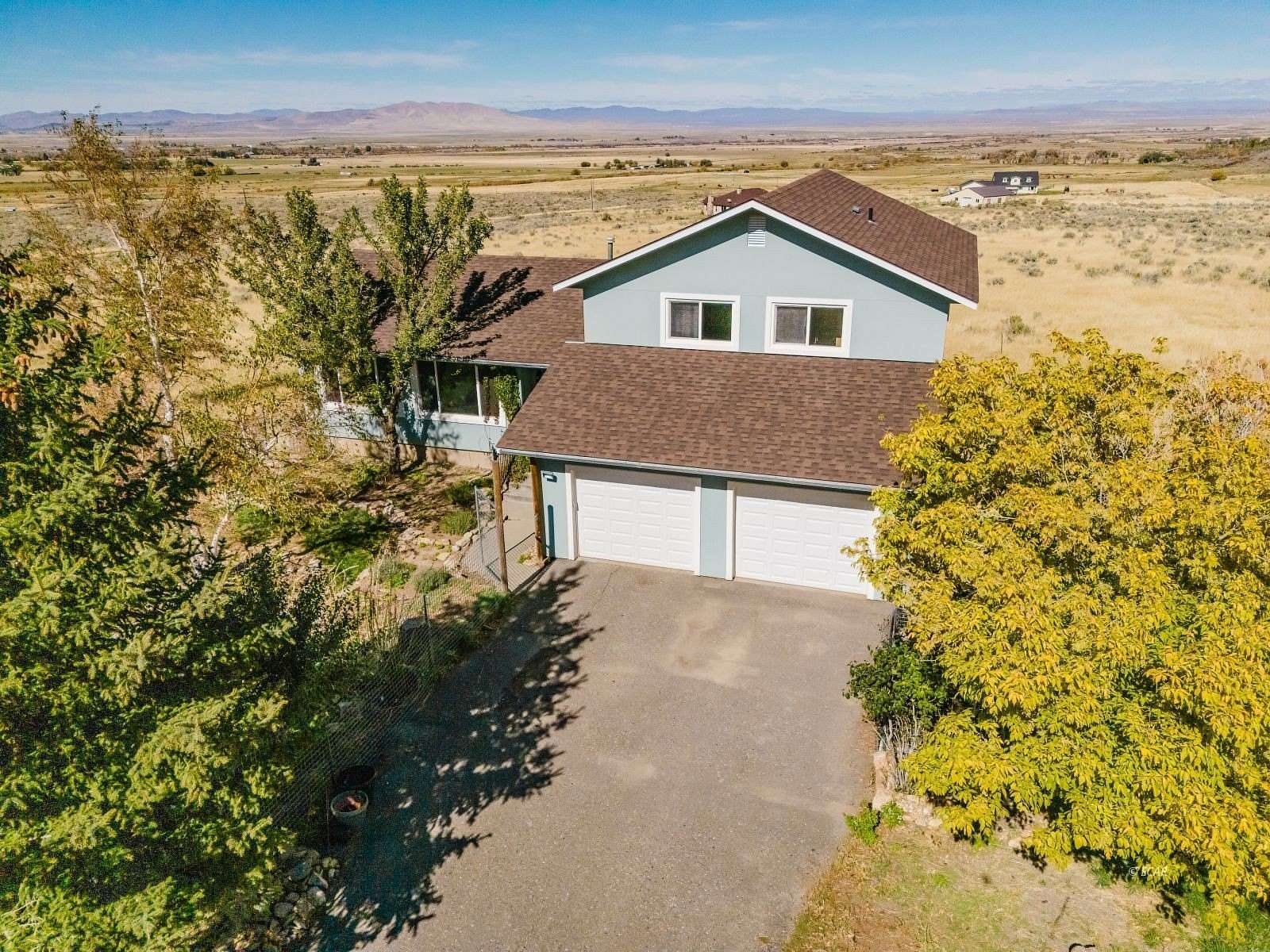 10 Acres of Land with Home for Sale in Lamoille, Nevada