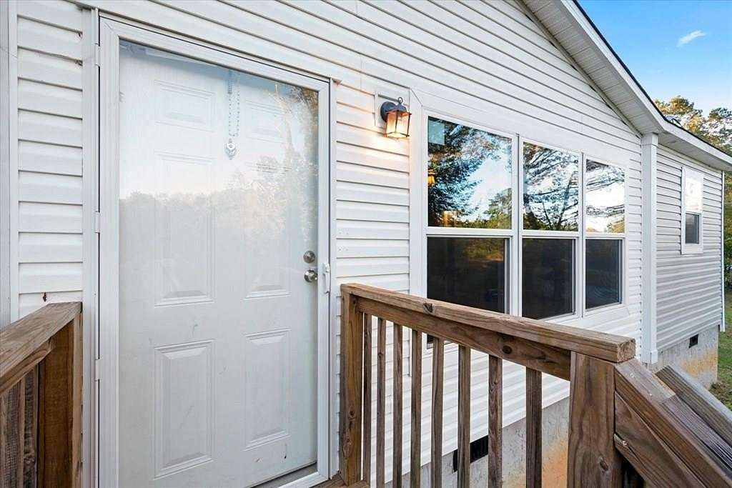 2.2 Acres of Residential Land with Home for Sale in Cohutta, Georgia