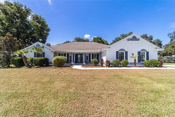 10.4 Acres of Land with Home for Sale in Citra, Florida