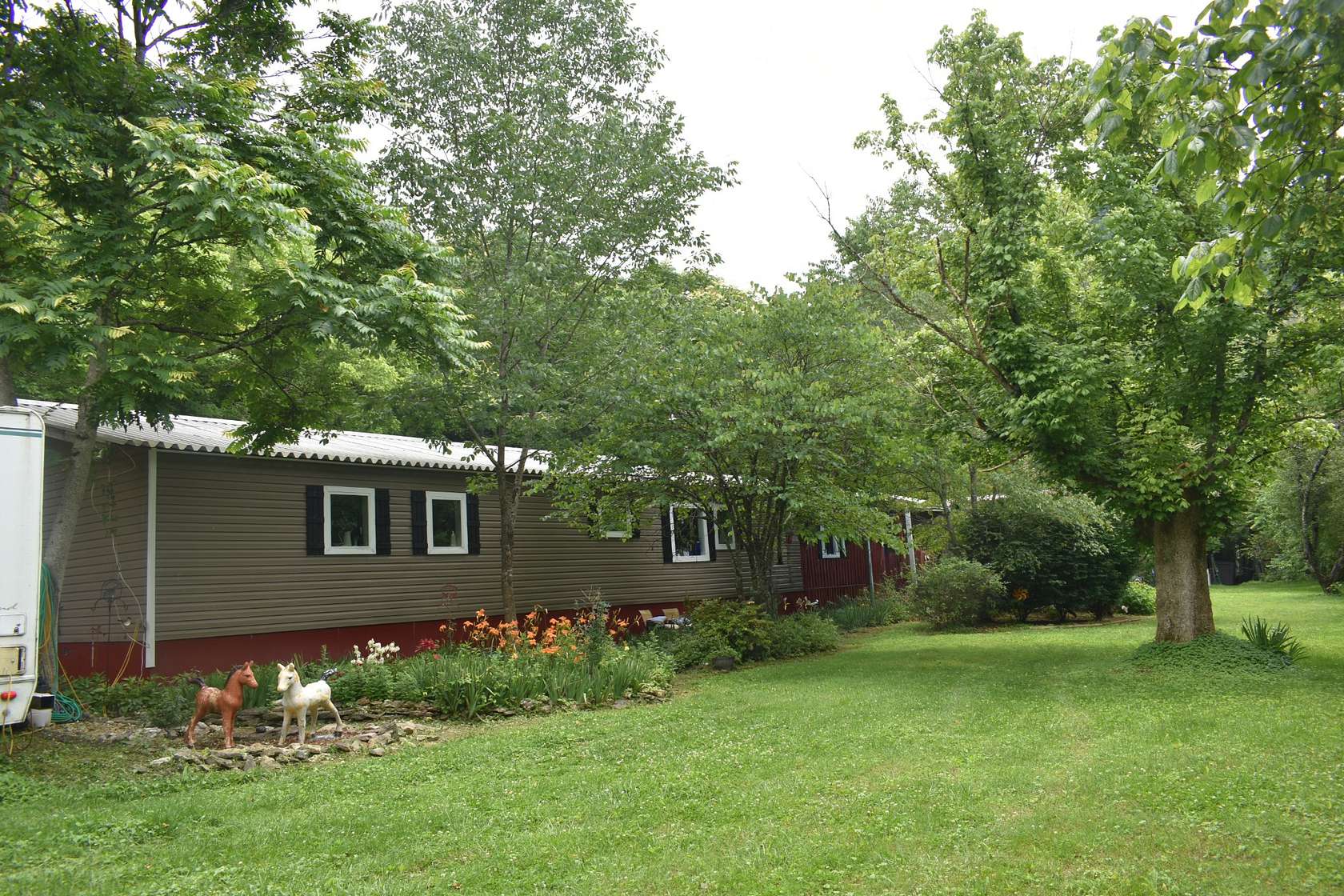 5 Acres of Residential Land with Home for Sale in Pleasant Shade, Tennessee