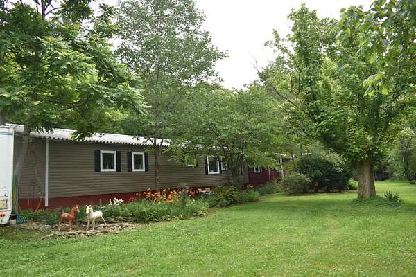 5 Acres of Residential Land with Home for Sale in Pleasant Shade, Tennessee