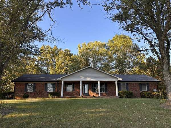 2.6 Acres of Residential Land with Home for Sale in Scottsville, Kentucky