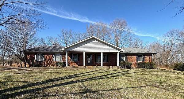 2.6 Acres of Land with Home for Sale in Scottsville, Kentucky