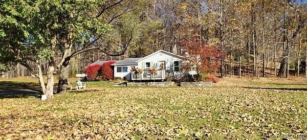 2 Acres of Residential Land with Home for Sale in Ortonville, Michigan