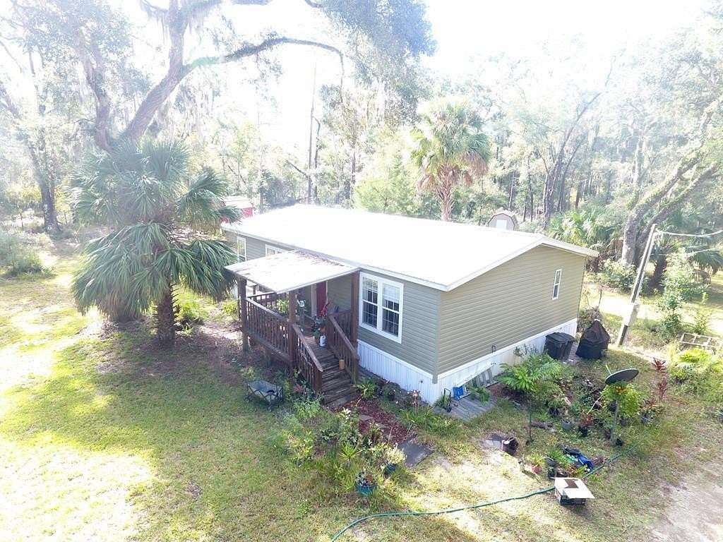 2.5 Acres of Residential Land with Home for Sale in Chiefland, Florida