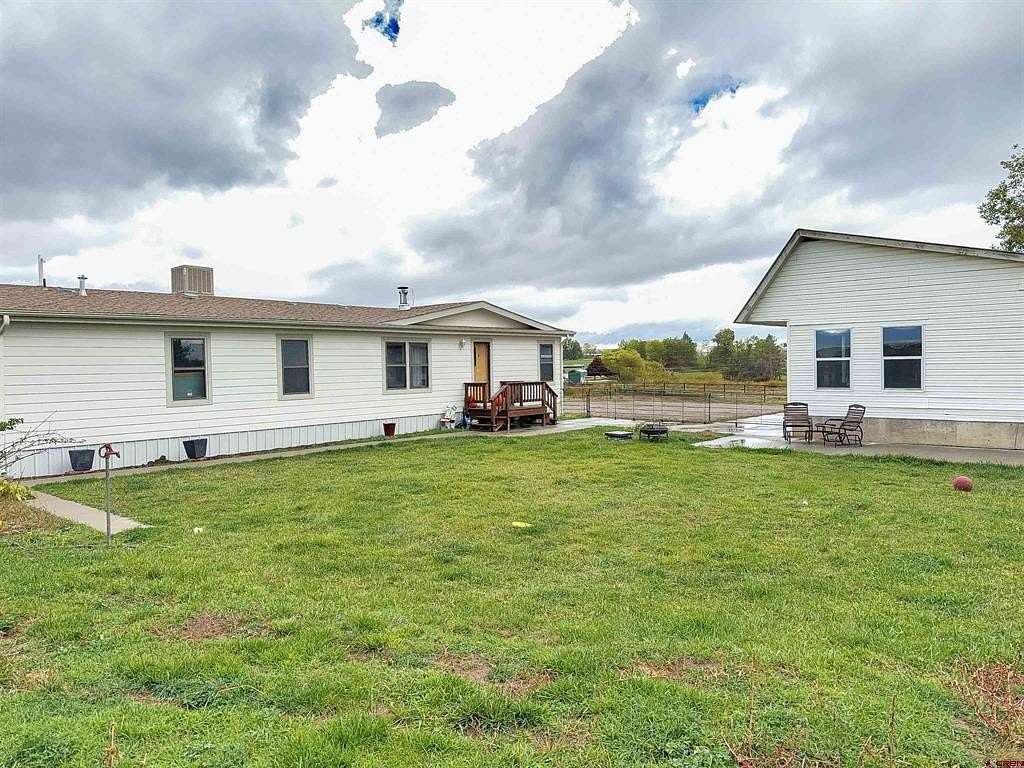 5 Acres of Residential Land with Home for Sale in Cortez, Colorado