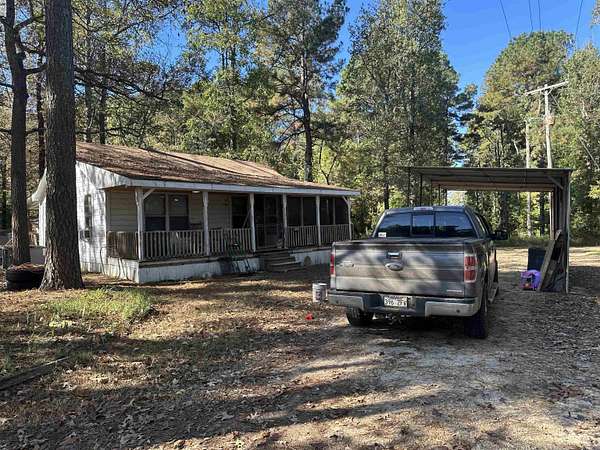 13.6 Acres of Land with Home for Sale in Redfield, Arkansas