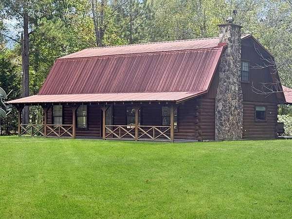 2.5 Acres of Residential Land with Home for Sale in Woodville, Texas