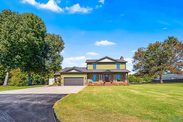 10 Acres of Residential Land with Home for Sale in Harvest, Alabama