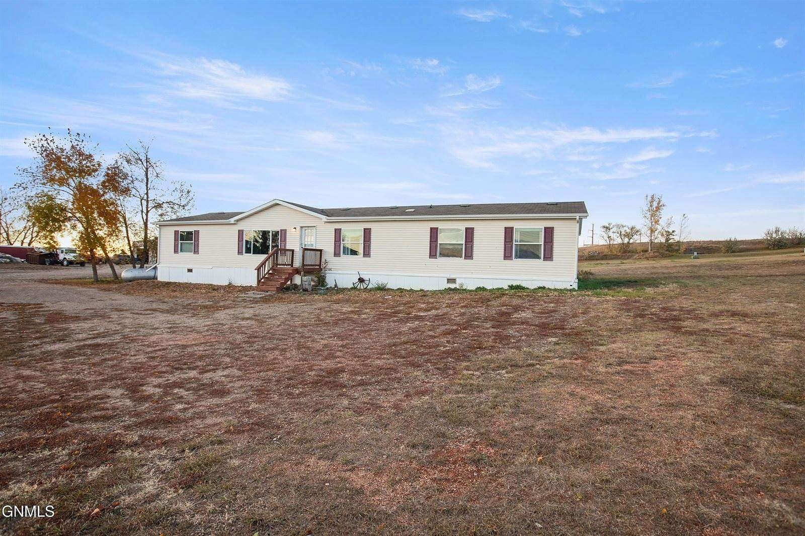 1.84 Acres of Residential Land with Home for Sale in Williston, North Dakota