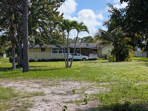 2.4 Acres of Residential Land with Home for Sale in Stuart, Florida