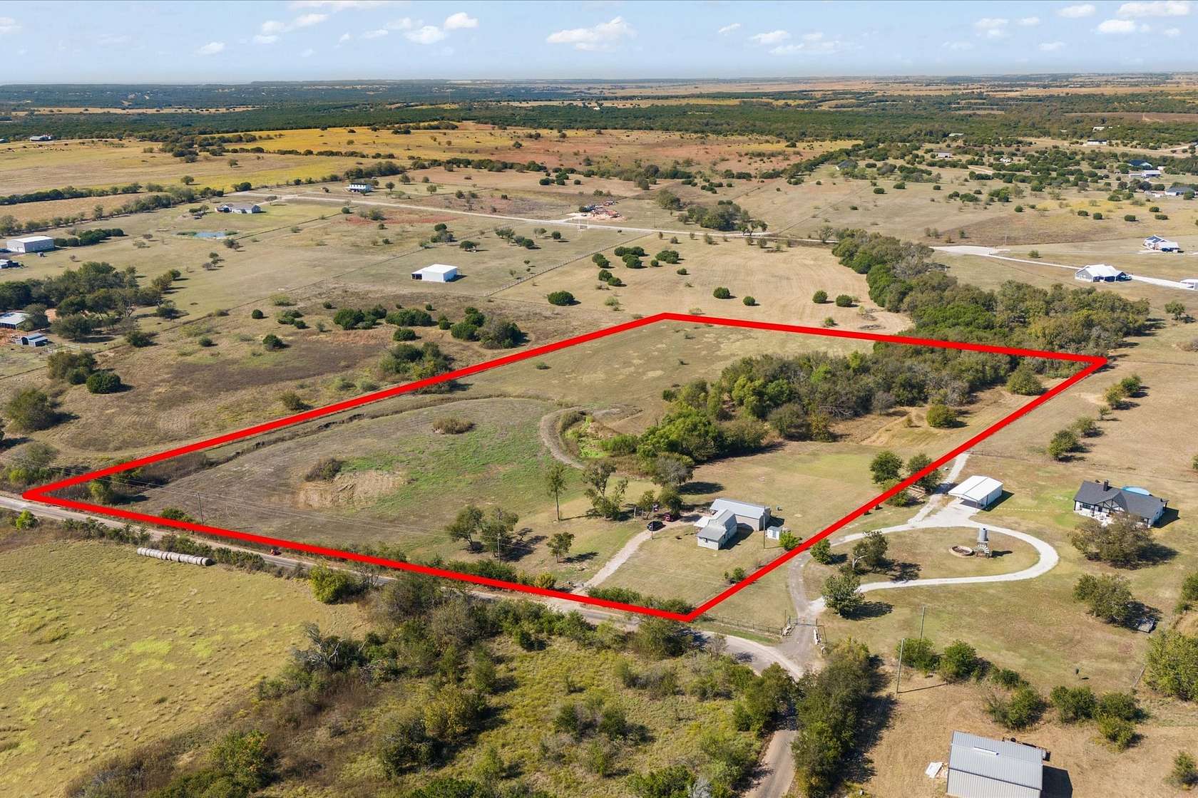 11 Acres of Recreational Land with Home for Sale in Blum, Texas