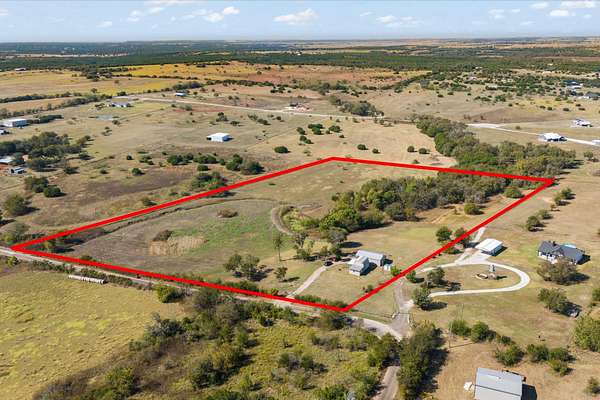 11 Acres of Recreational Land with Home for Sale in Blum, Texas