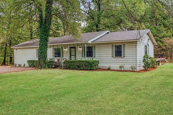 12.3 Acres of Land with Home for Sale in Paris, Texas