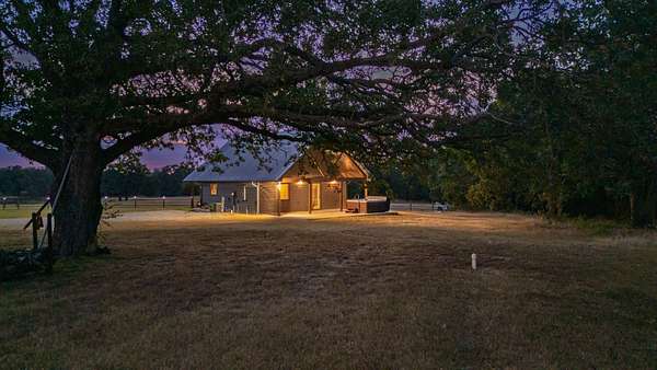 75.7 Acres of Recreational Land with Home for Sale in Sulphur Springs, Texas