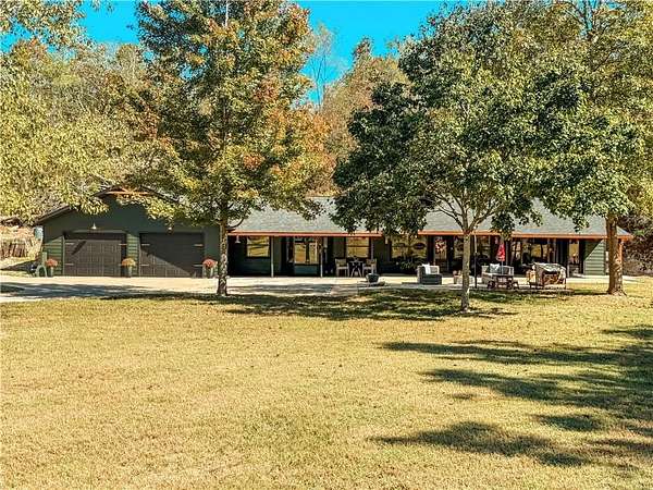 6.76 Acres of Residential Land with Home for Sale in Siloam Springs, Arkansas