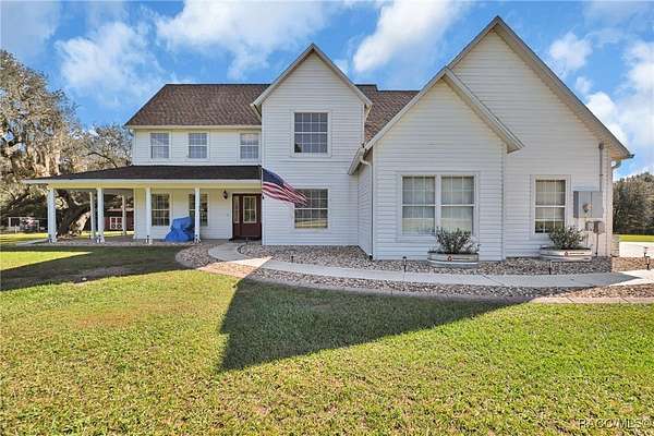 2.62 Acres of Residential Land with Home for Sale in Floral City, Florida