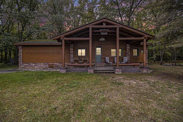 54 Acres of Recreational Land with Home for Sale in Manistee, Michigan