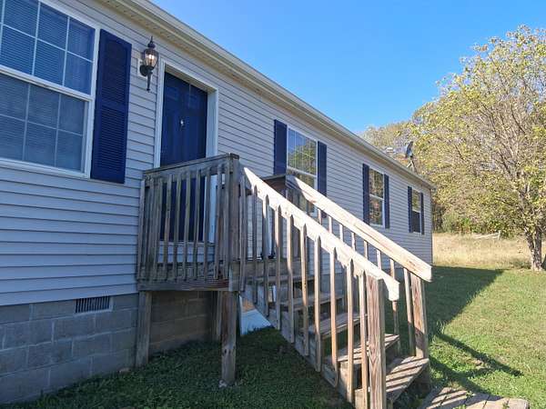 2.1 Acres of Residential Land with Home for Auction in New Straitsville, Ohio