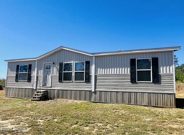 5 Acres of Residential Land with Home for Sale in Collinsville, Mississippi