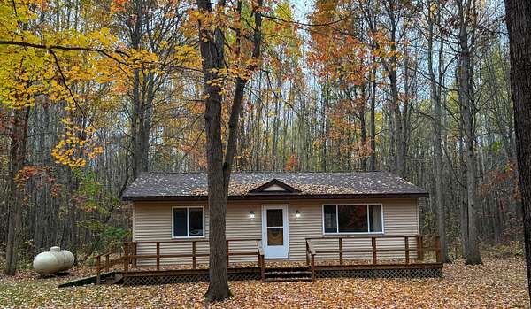 10 Acres of Residential Land with Home for Sale in Houghton Lake, Michigan