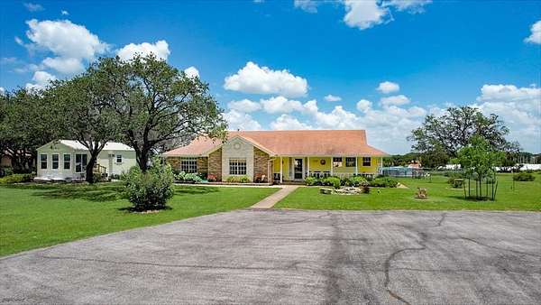 2 Acres of Residential Land with Home for Sale in Johnson City, Texas