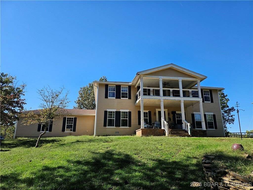 29.4 Acres of Recreational Land with Home for Sale in Stover, Missouri