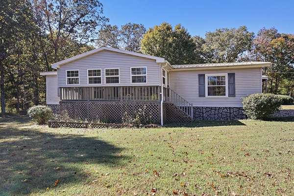 18.1 Acres of Land with Home for Sale in Lyles, Tennessee