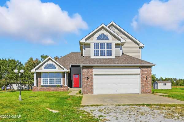 9 Acres of Residential Land with Home for Sale in Asbury, Missouri