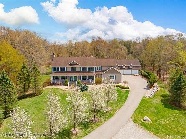 12.5 Acres of Land with Home for Sale in Leonard, Michigan