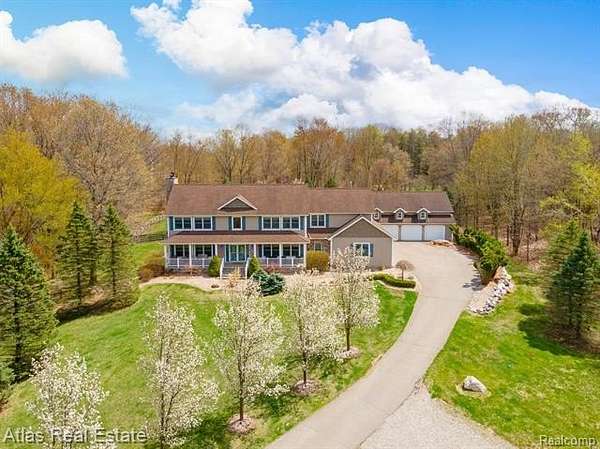 12.5 Acres of Land with Home for Sale in Leonard, Michigan