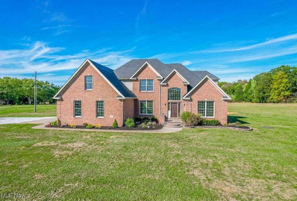 6.4 Acres of Residential Land with Home for Sale in Louisville, Ohio