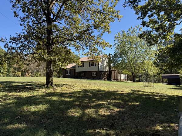 6.2 Acres of Land with Home for Sale in Waverly, Tennessee