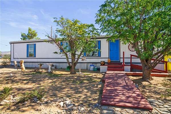 2.5 Acres of Residential Land with Home for Sale in Golden Valley, Arizona