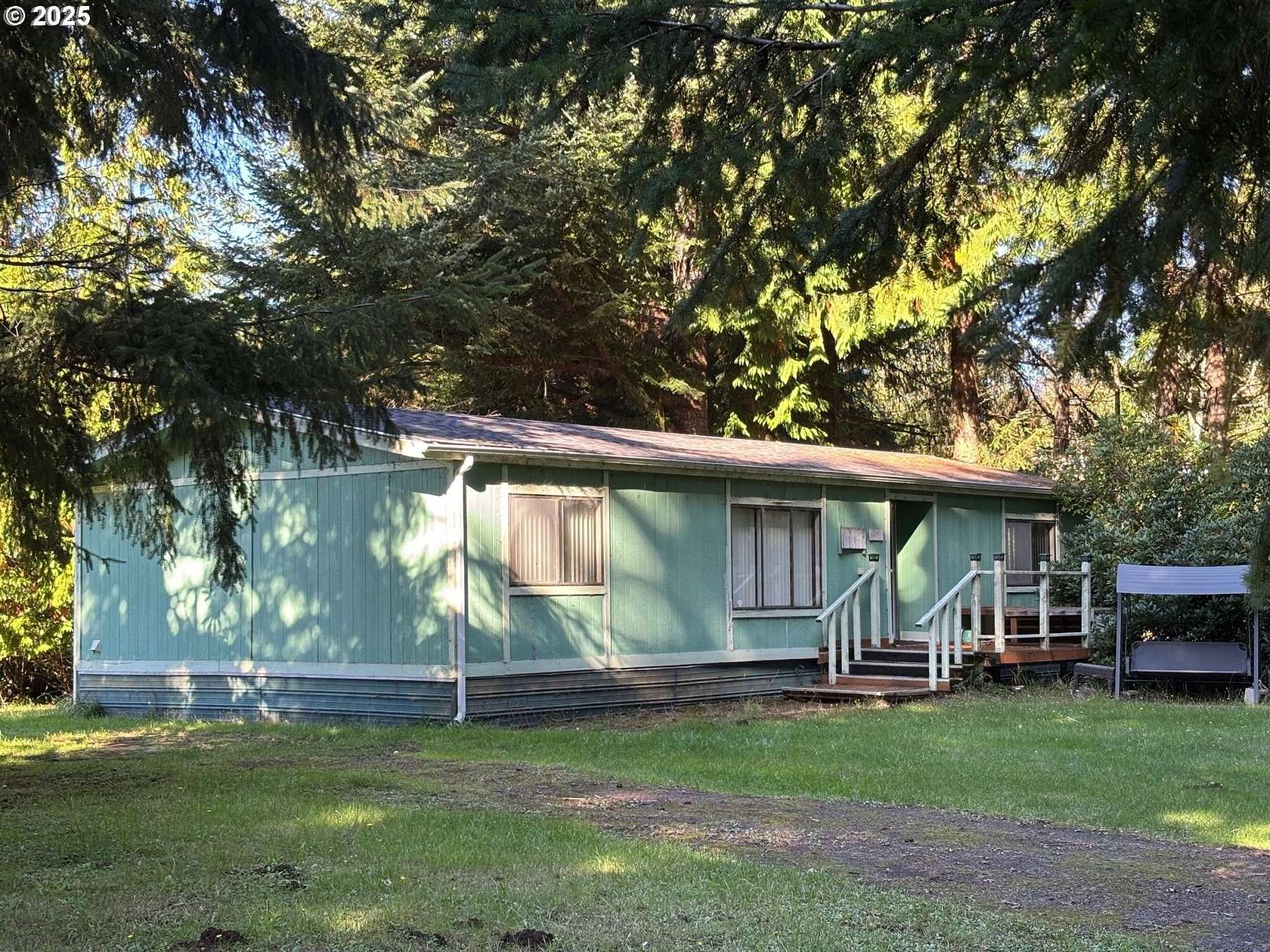 1.89 Acres of Residential Land with Home for Sale in North Bend, Oregon