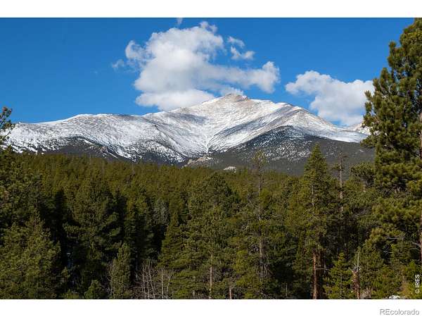 25.6 Acres of Land with Home for Sale in Allenspark, Colorado