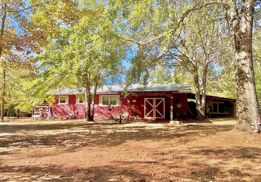 5 Acres of Residential Land with Home for Sale in Elkhart, Texas