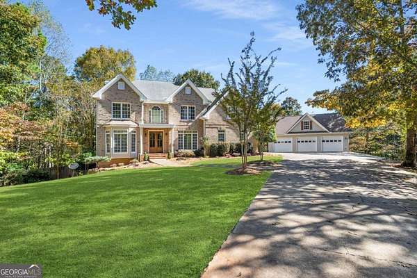 11 Acres of Land with Home for Sale in Ball Ground, Georgia