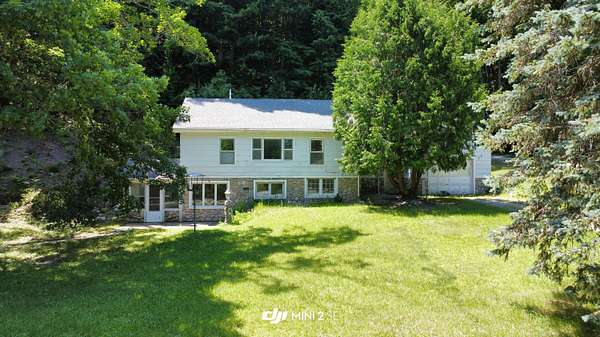 16.9 Acres of Land with Home for Sale in Harrisville, Michigan