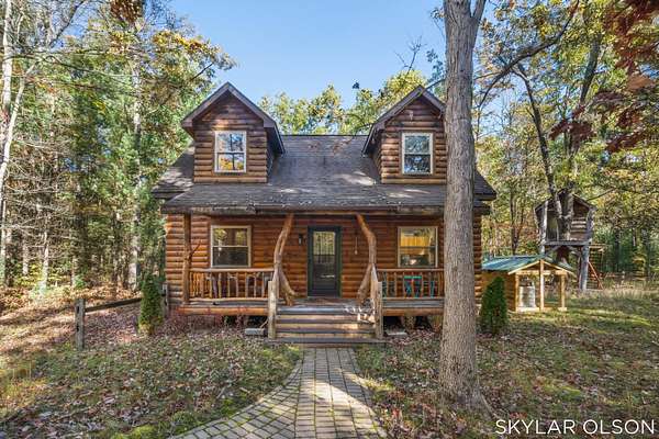 20 Acres of Recreational Land with Home for Sale in Free Soil, Michigan